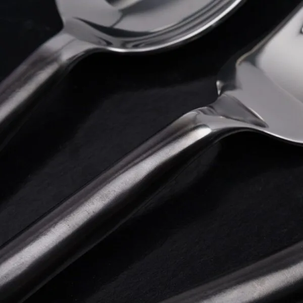 Handcrafted unpolished rolled handle flatware set by Thai artisans